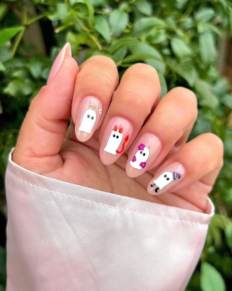 Ghost nails with halloween costumes